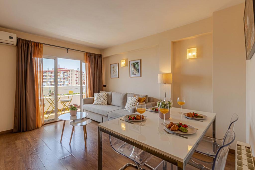 A seating area at 797 Holiday Rentals- Atico en Arroyo de la miel con hermosas vistas