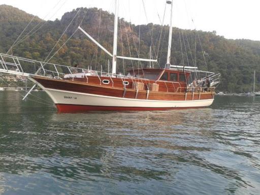 a boat sitting in the water on the water at yatch ltd. in Silivri