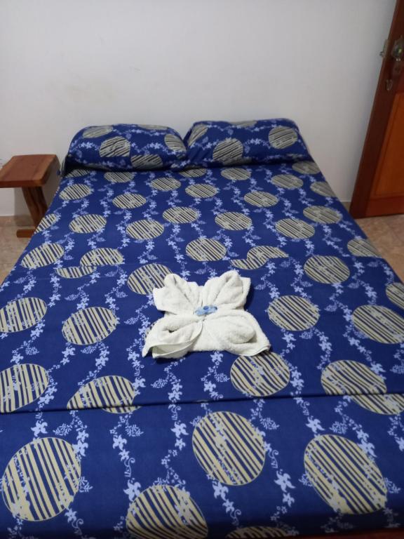 Postel nebo postele na pokoji v ubytování Hotel CHAFO