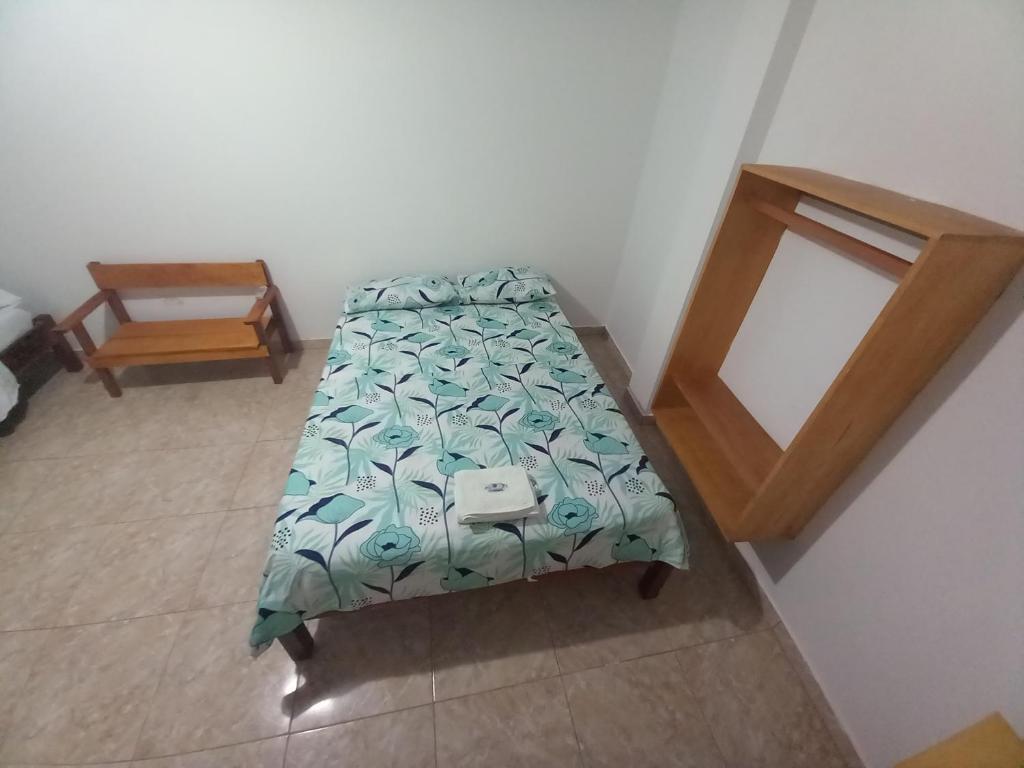 Postel nebo postele na pokoji v ubytování Hotel CHAFO