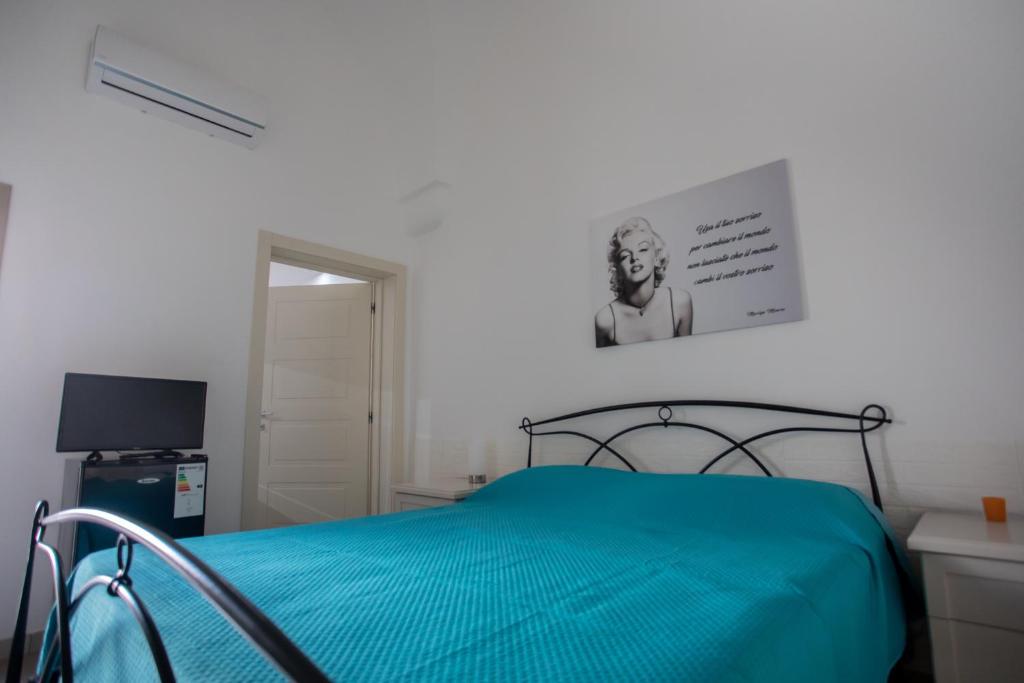 A bed or beds in a room at Bed&Dreams in Salento Camera Matrimoniale con bagno privato