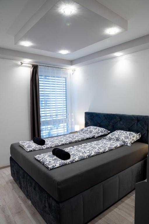 Posteľ alebo postele v izbe v ubytovaní Dream Apartman 3 with Free Parking