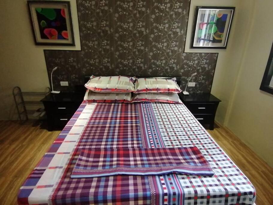 Postel nebo postele na pokoji v ubytování Avana Hills Tagaytay Villa