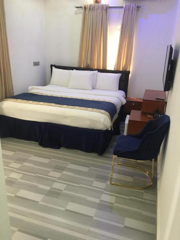 Postel nebo postele na pokoji v ubytování Credence Resorts Aco