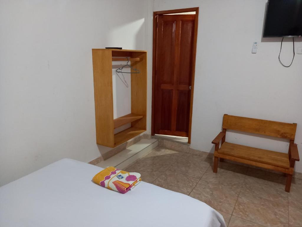 Postel nebo postele na pokoji v ubytování Hotel CHAFO