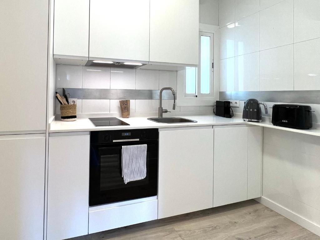 A kitchen or kitchenette at Click&Flat Rizal