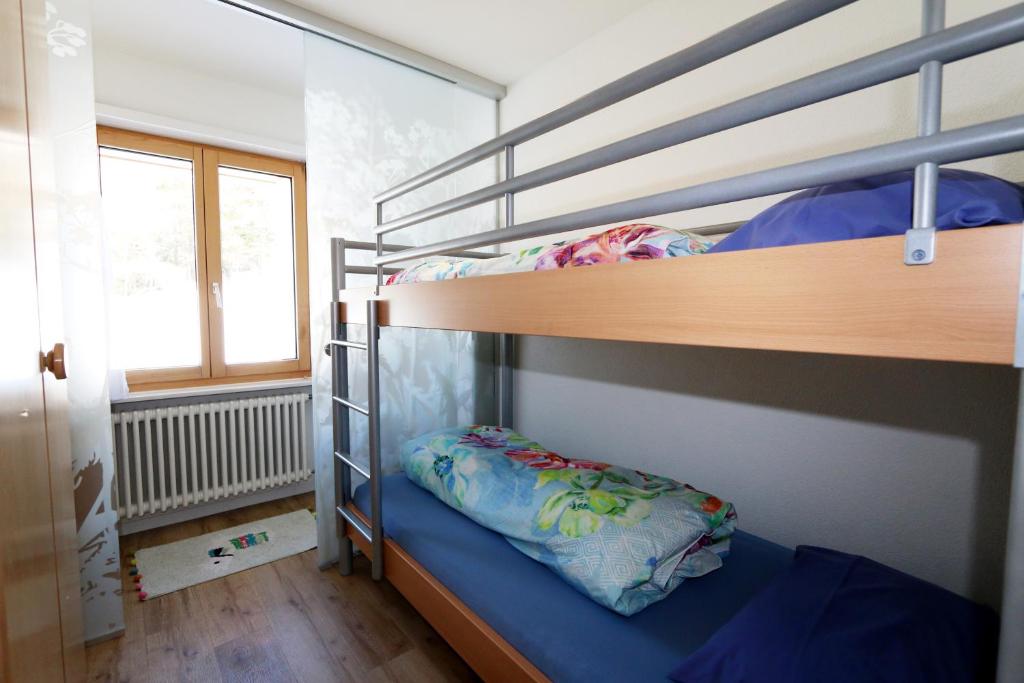Postel nebo postele na pokoji v ubytování Adora