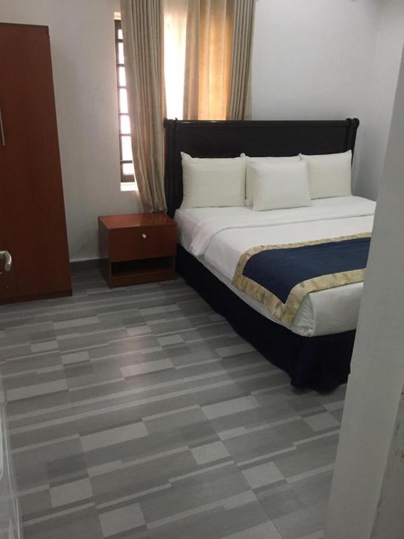 Postel nebo postele na pokoji v ubytování Credence Resorts Aco
