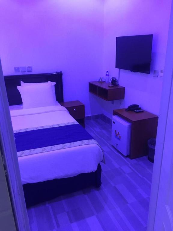 Postel nebo postele na pokoji v ubytování Credence Resorts Aco
