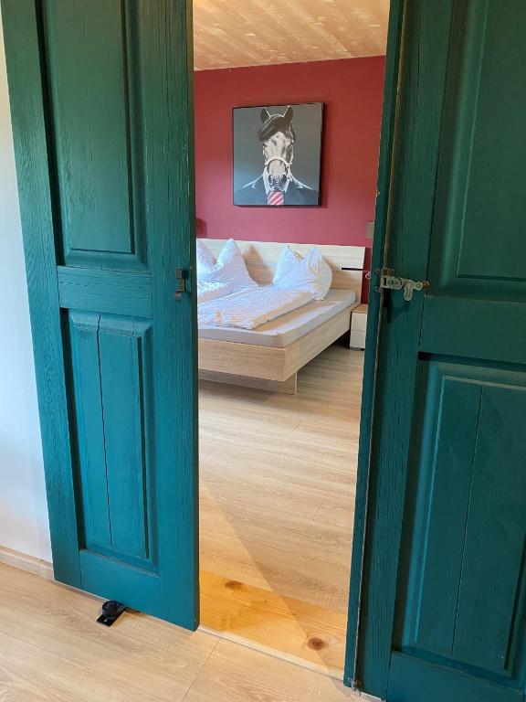 Postel nebo postele na pokoji v ubytování Hotel Sonnenlicht Maria Alm