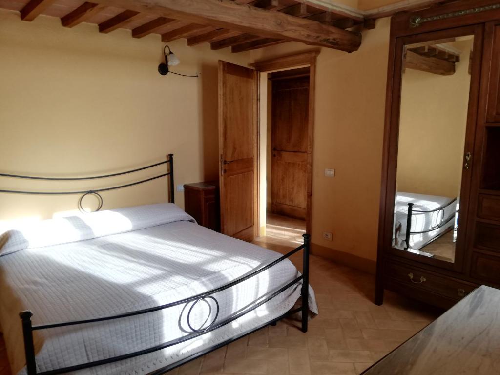 Postel nebo postele na pokoji v ubytování Podere Sant'Antonio