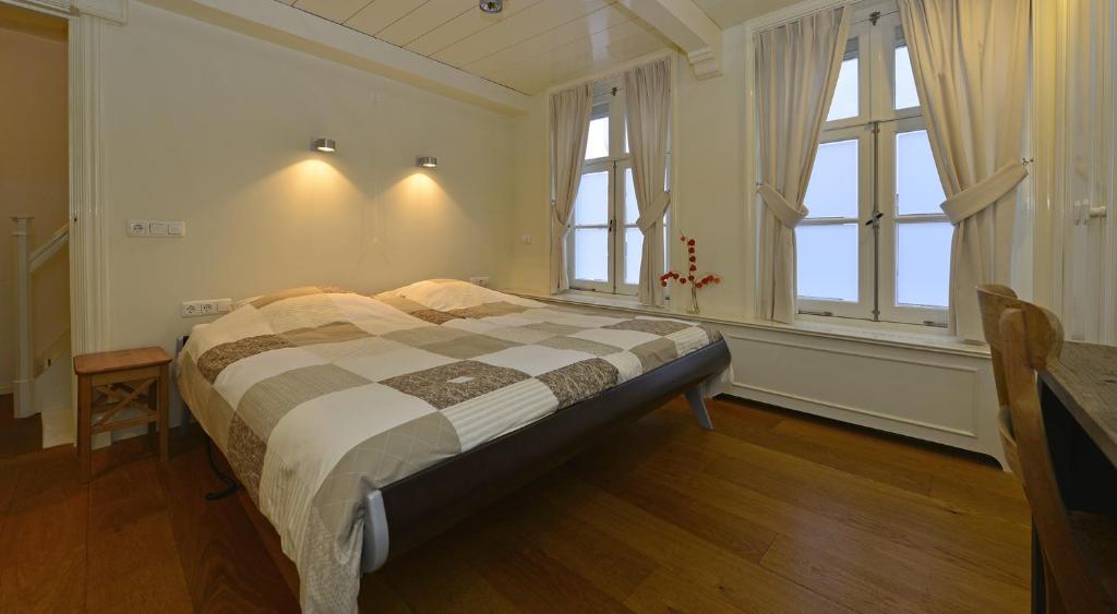 Cama ou camas em um quarto em De Witte Olyphant