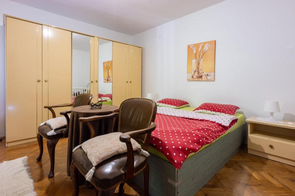Postel nebo postele na pokoji v ubytování Apartment RENATA