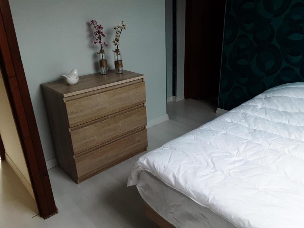 Postel nebo postele na pokoji v ubytování Appartement du parc