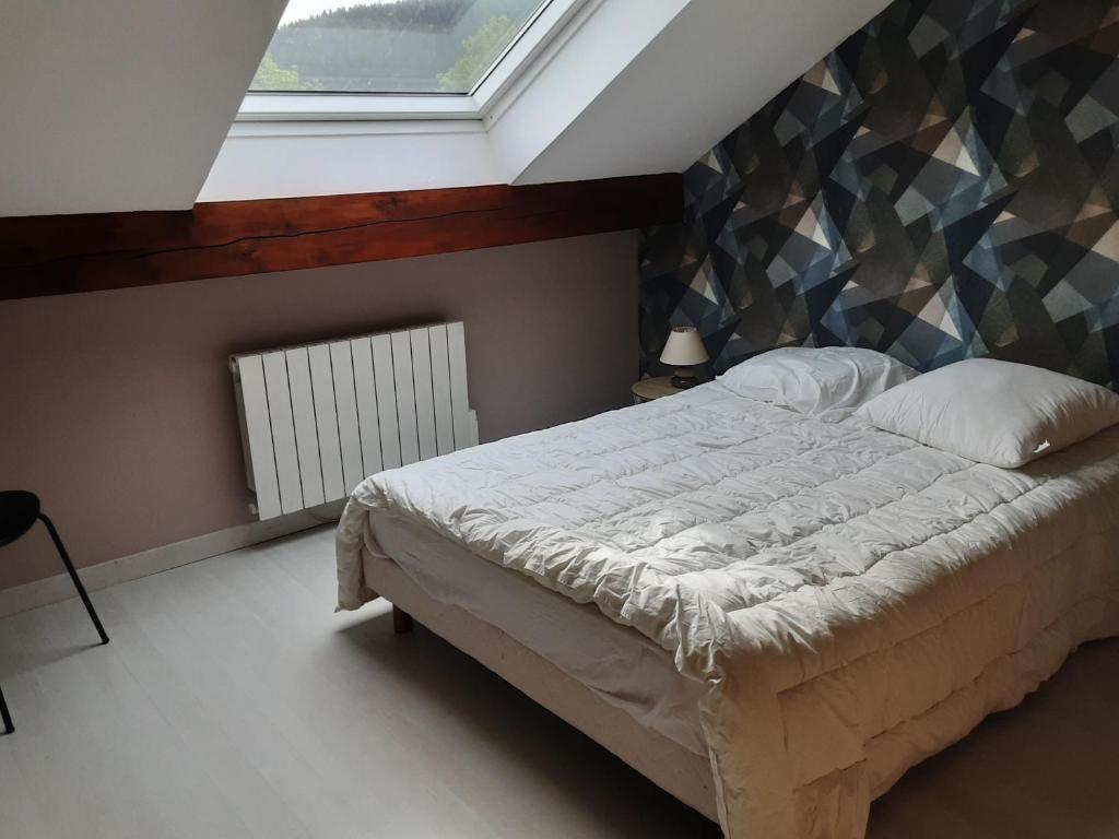 Postel nebo postele na pokoji v ubytování Appartement du parc