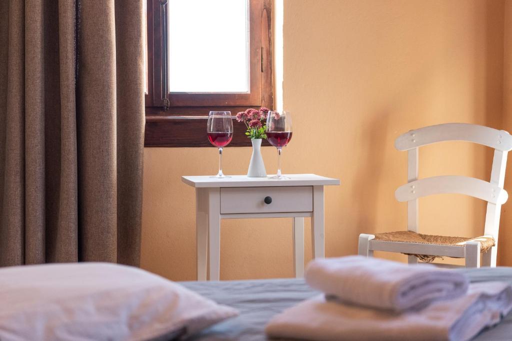 Voodi või voodid majutusasutuse Kentavros Hotel toas