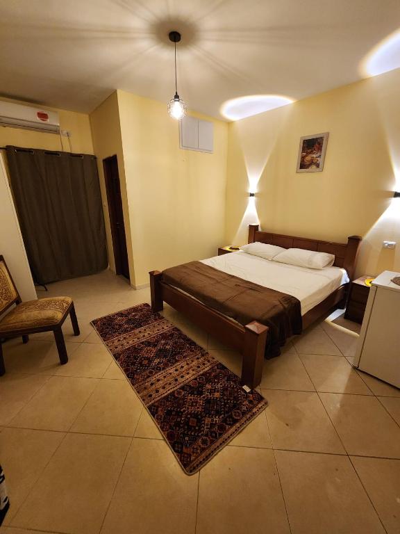 Postel nebo postele na pokoji v ubytování Seedi Yousef Hostel & Cafe