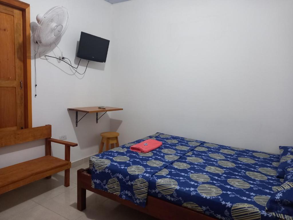 Postel nebo postele na pokoji v ubytování Hotel CHAFO
