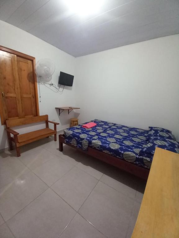 Postel nebo postele na pokoji v ubytování Hotel CHAFO