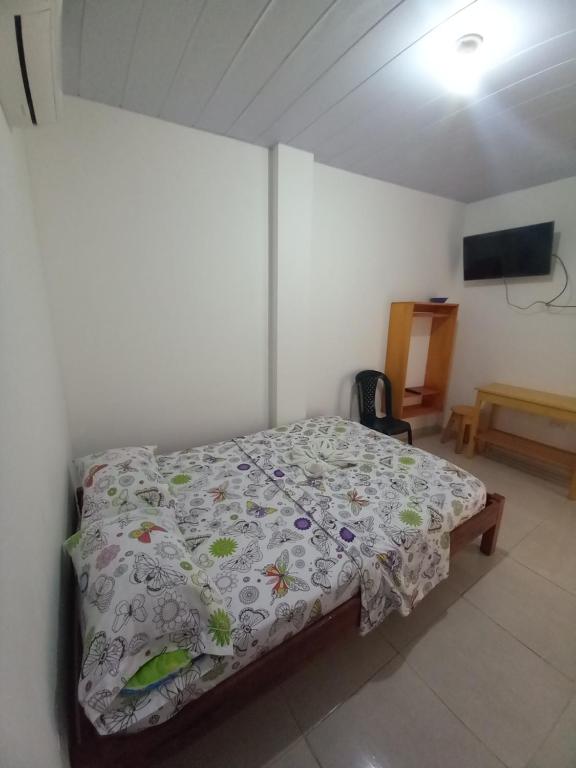 Postel nebo postele na pokoji v ubytování Hotel CHAFO