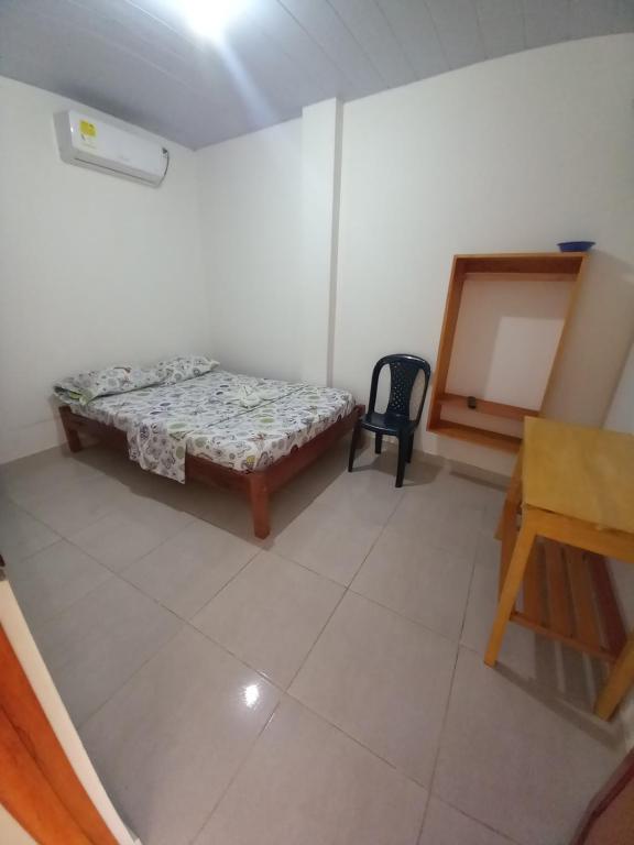 Postel nebo postele na pokoji v ubytování Hotel CHAFO