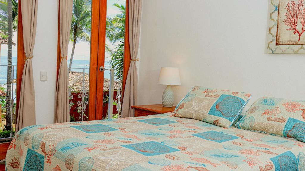 Una cama o camas en una habitación de Hotel Punta Franca