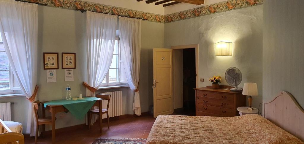 A bed or beds in a room at Soggiorno Dimora Del Grifo