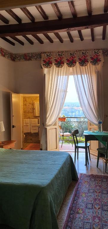 A bed or beds in a room at Soggiorno Dimora Del Grifo