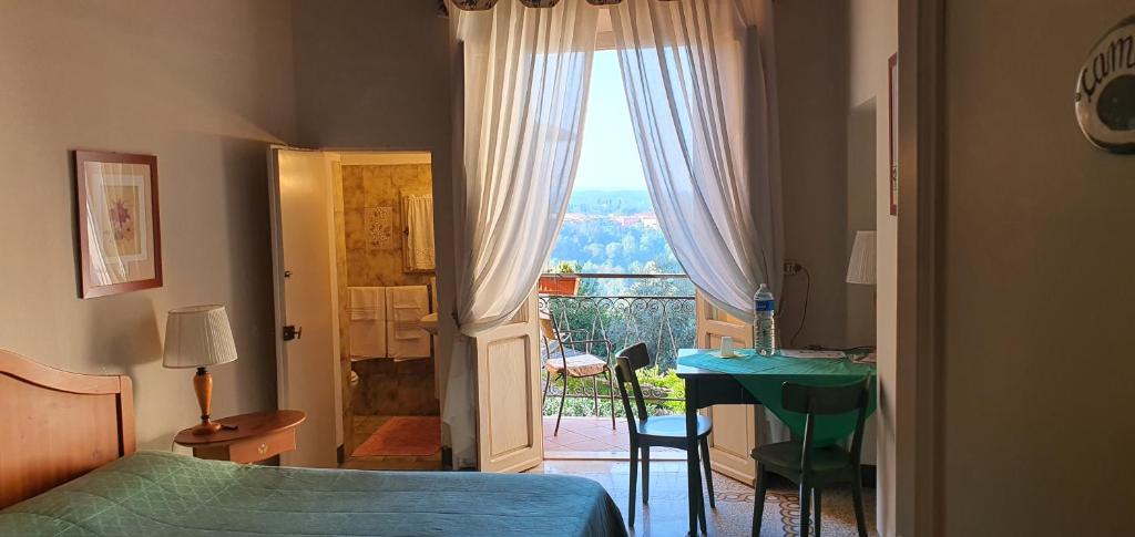 A bed or beds in a room at Soggiorno Dimora Del Grifo
