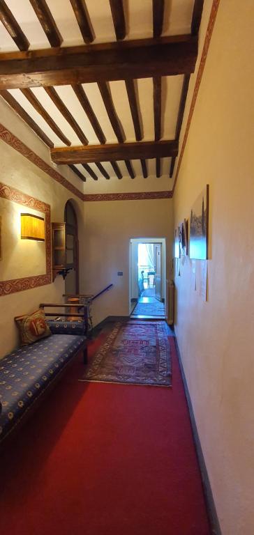 A bed or beds in a room at Soggiorno Dimora Del Grifo