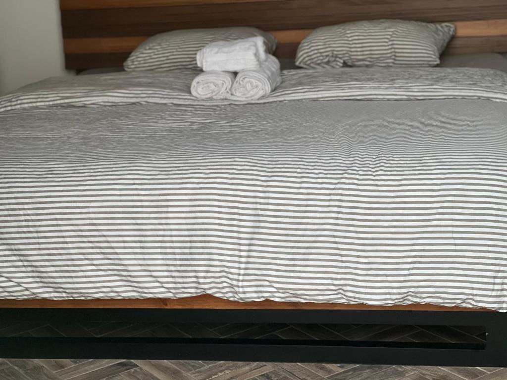 Postel nebo postele na pokoji v ubytování Corcho rooms