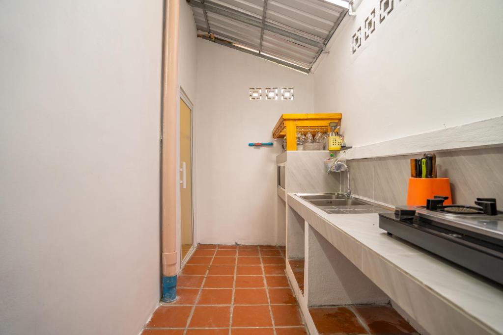 Kuchyň nebo kuchyňský kout v ubytování Angkor Rithy Residence