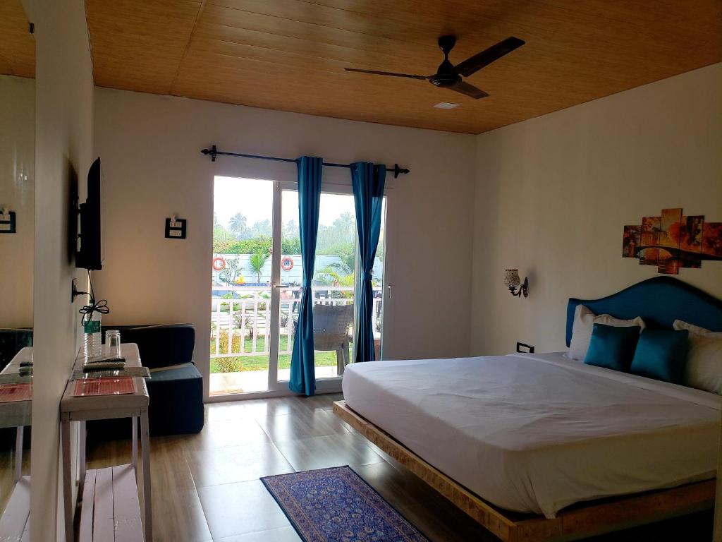 Postel nebo postele na pokoji v ubytování White Truffle Resort, Arambol
