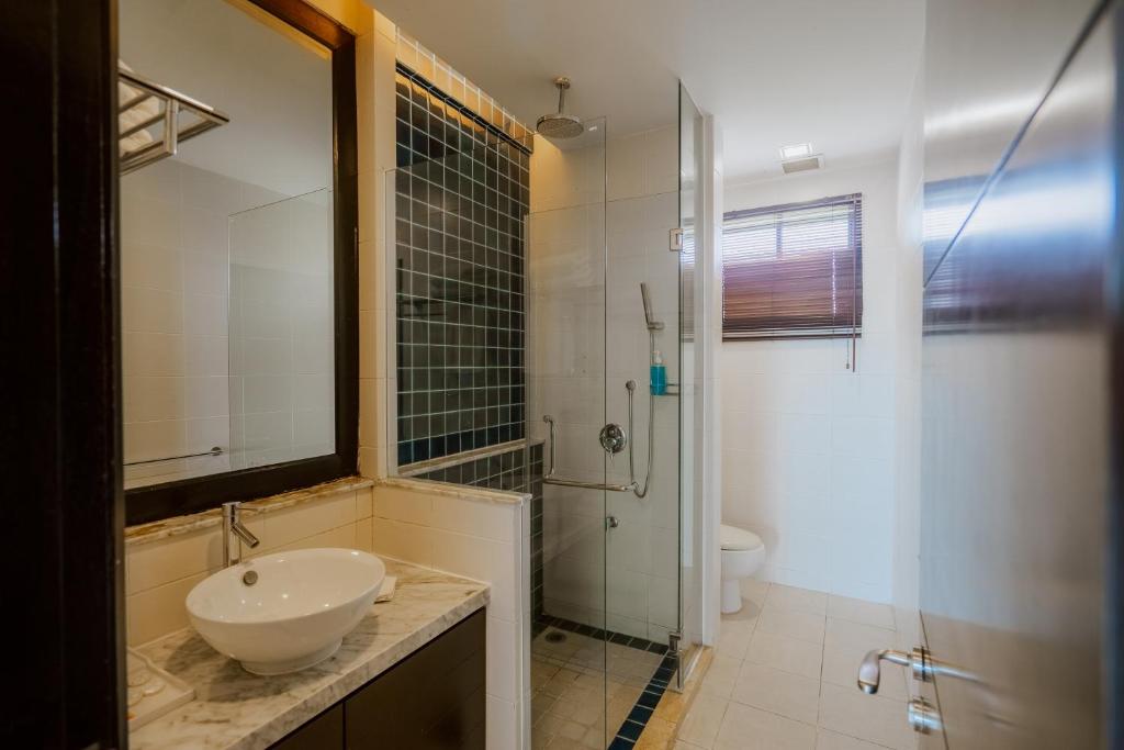 Koupelna v ubytování Borneo Beach Villa & Suite