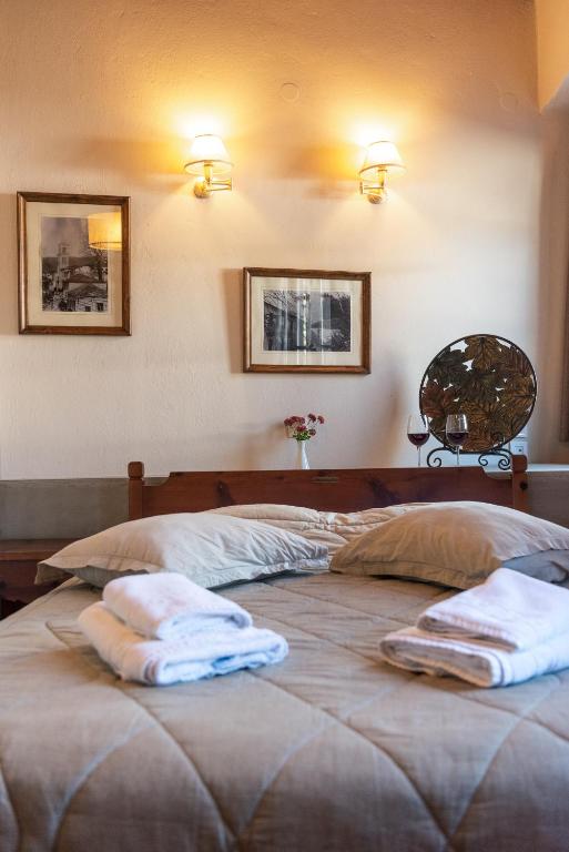 Voodi või voodid majutusasutuse Kentavros Hotel toas