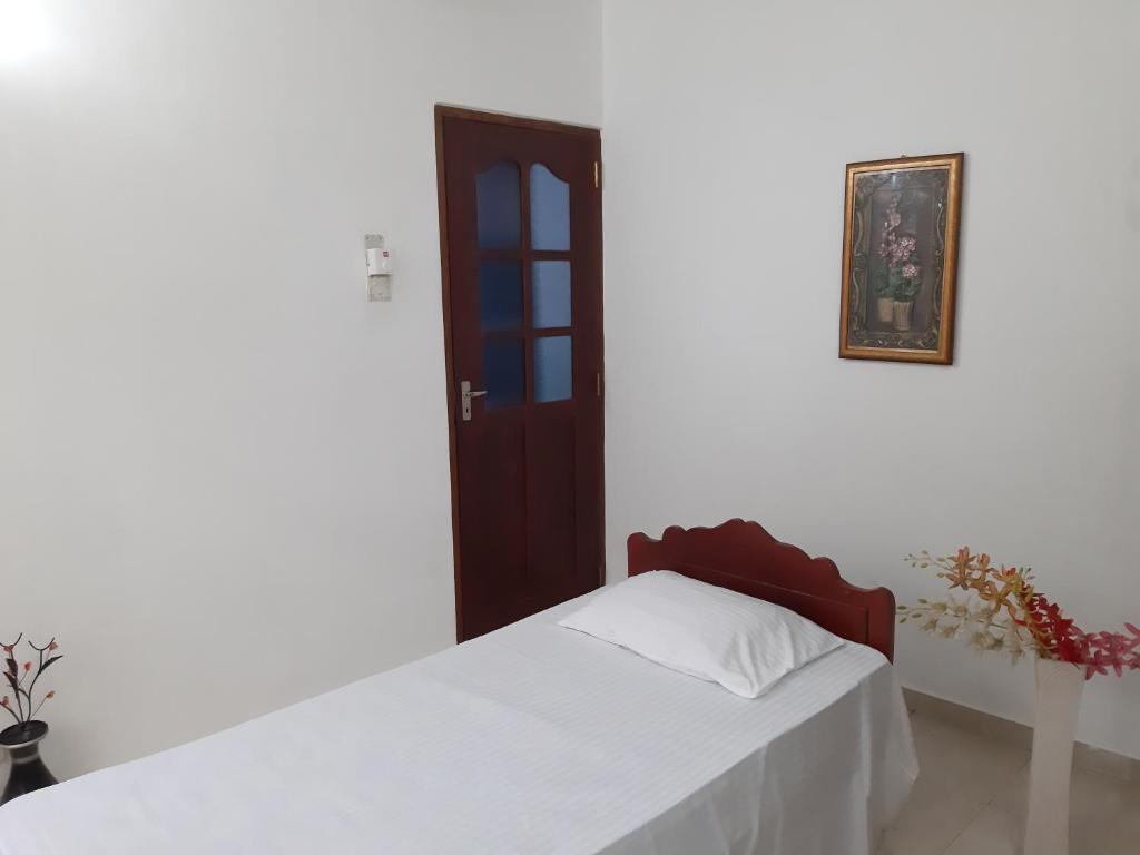 Postel nebo postele na pokoji v ubytování Hellen homestay