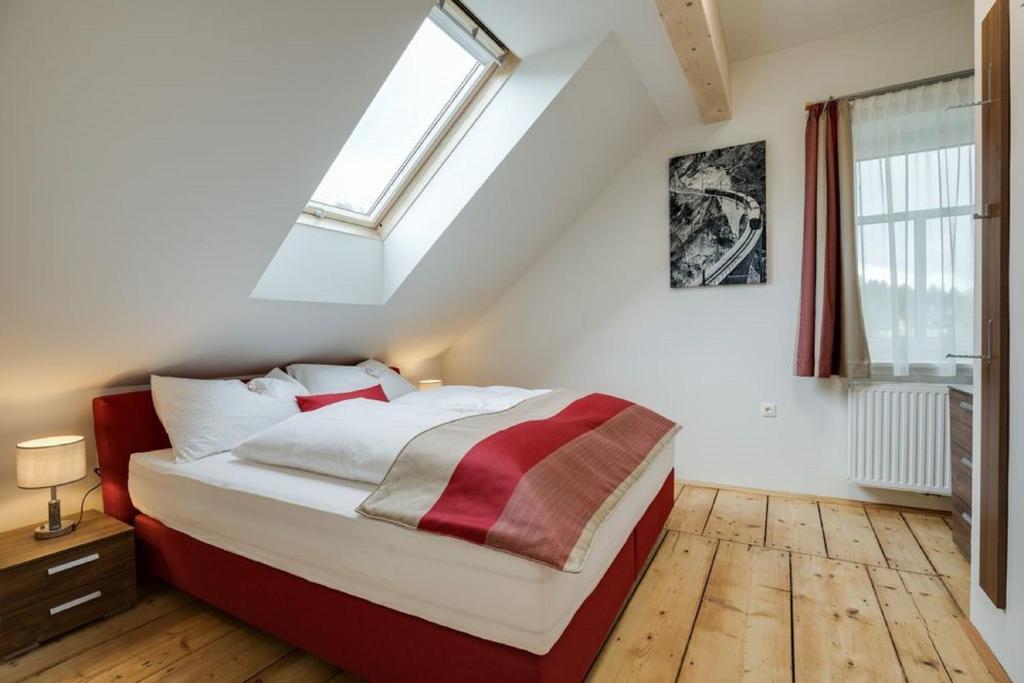 Postel nebo postele na pokoji v ubytování Konrad-Haus - DorfResort Mitterbach