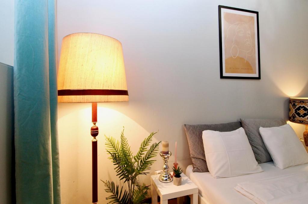 A bed or beds in a room at Artist Studio in City Center