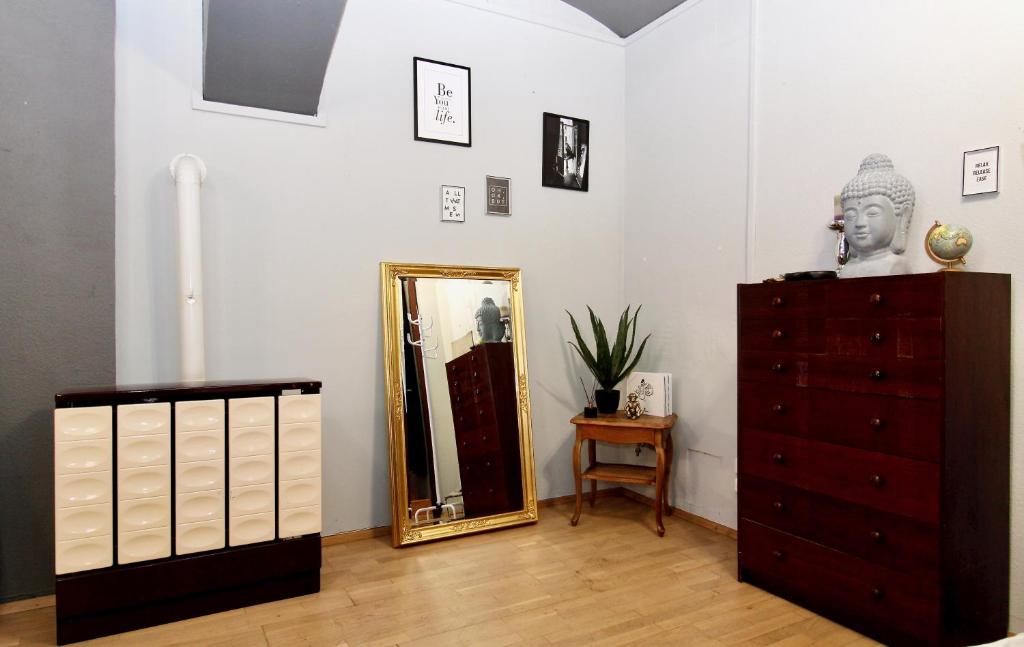 A bed or beds in a room at Artist Studio in City Center