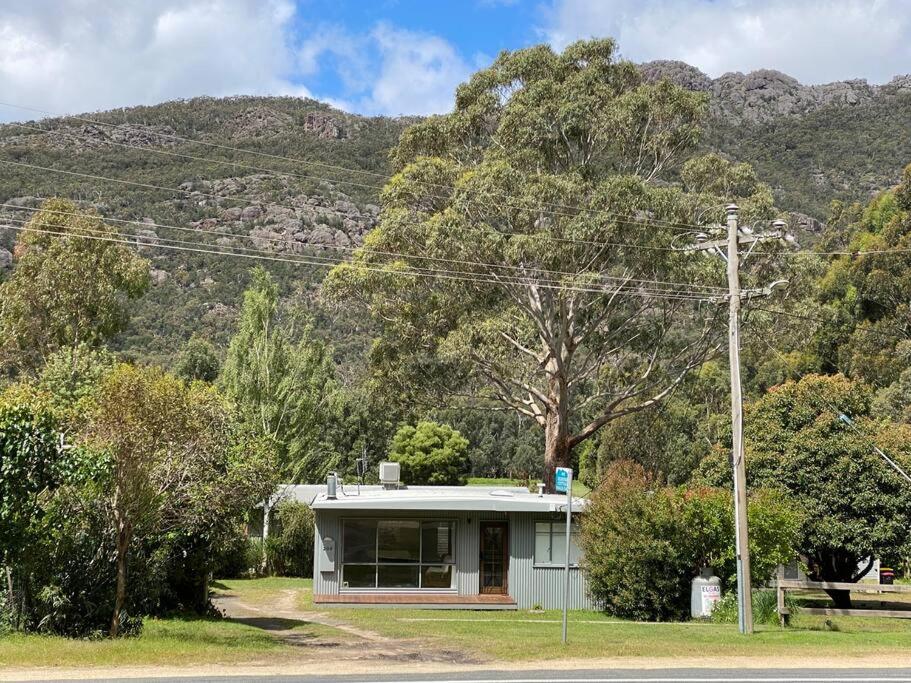 a small house in front of a mountain at 3 Bedroom Holiday house in Halls Gap