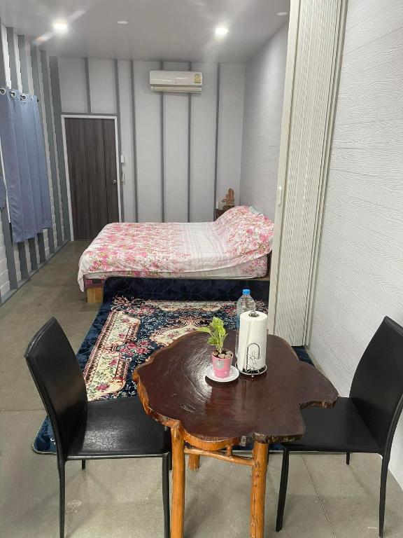 Postel nebo postele na pokoji v ubytování Hunny Home