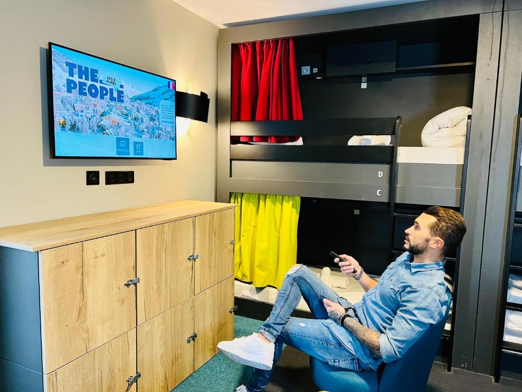 TV a/nebo společenská místnost v ubytování The People - Les 2 Alpes
