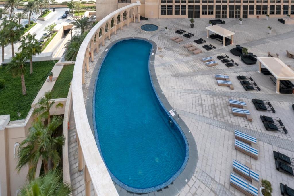 Bazén v ubytování Al Gassar Resort nebo v jeho okolí