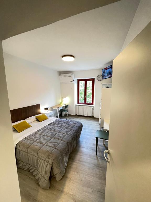 Łóżko lub łóżka w pokoju w obiekcie Smart Silver Apartment Central