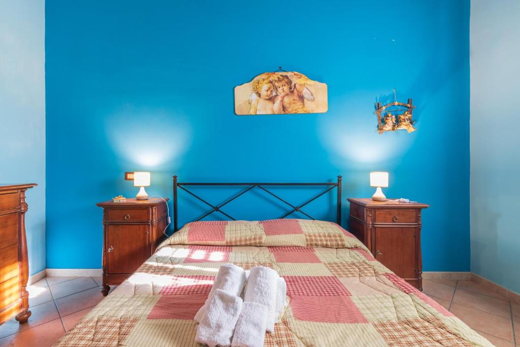 Posteľ alebo postele v izbe v ubytovaní Villa Gabri