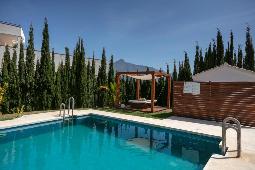 Bazén v ubytování Stunning renovated Apt Golden Banús! RDR254 nebo v jeho okolí