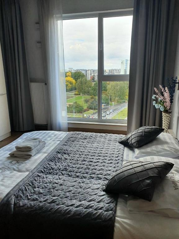 Posteľ alebo postele v izbe v ubytovaní Warsaw Apartments - Luxury Top-view Aparthotel