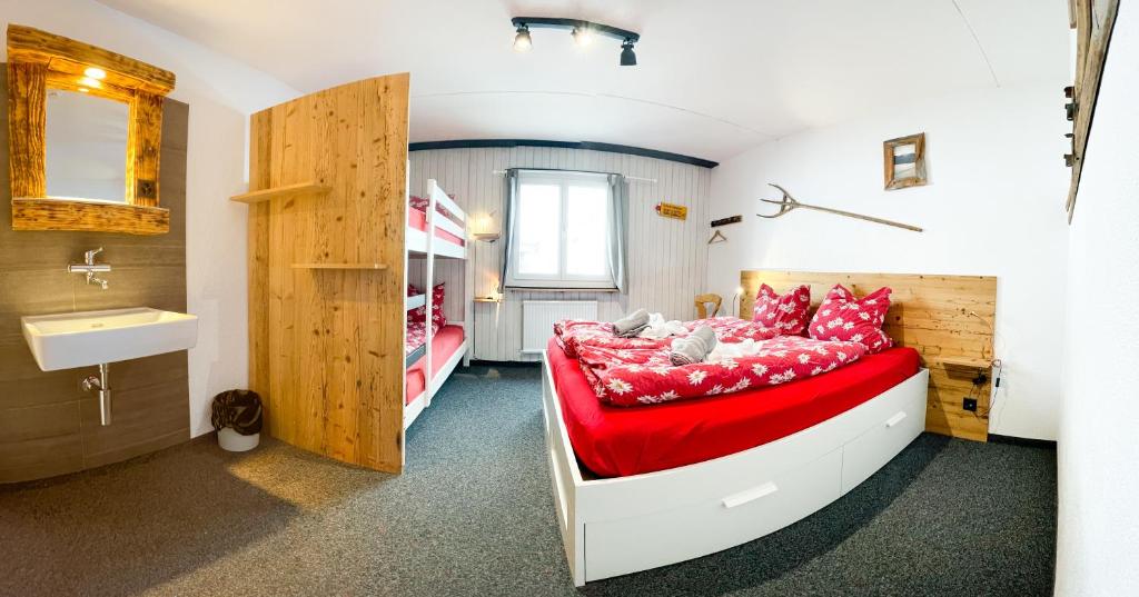 Postel nebo postele na pokoji v ubytování Heuberge