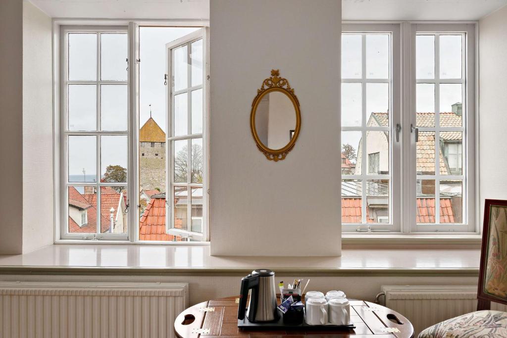 Příslušenství pro přípravu čaje a kávy v ubytování Best Western Strand Hotel