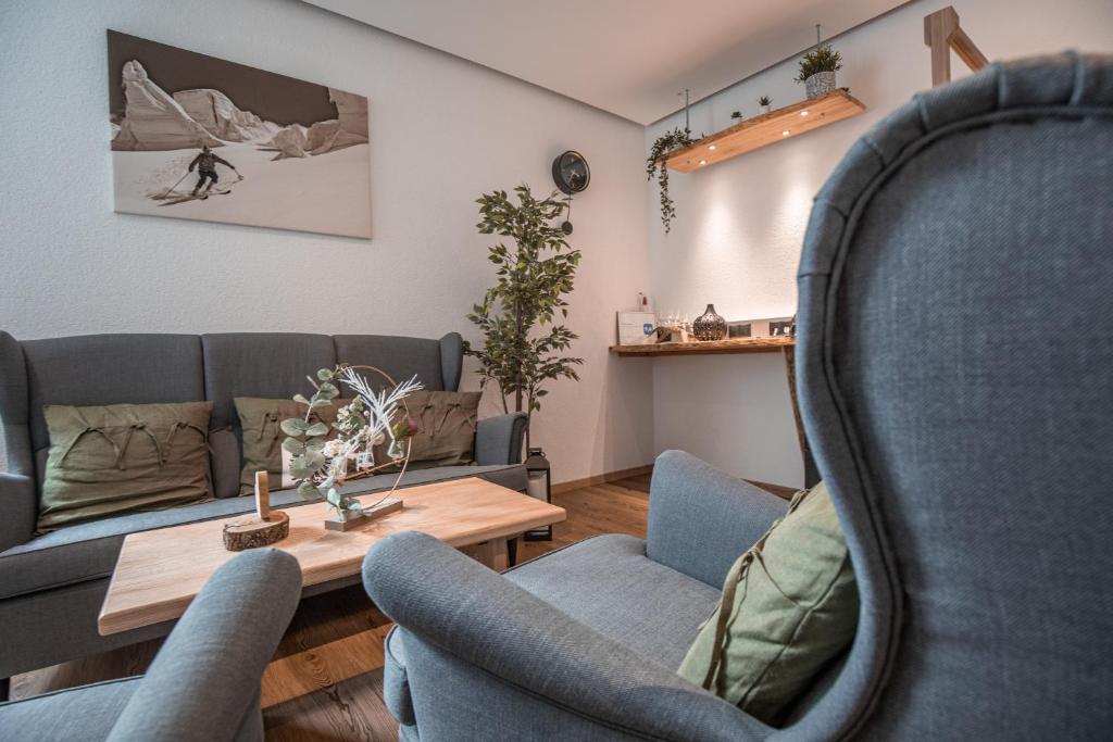 A seating area at Sportapart Schweighofer Ski-in & Ski-out